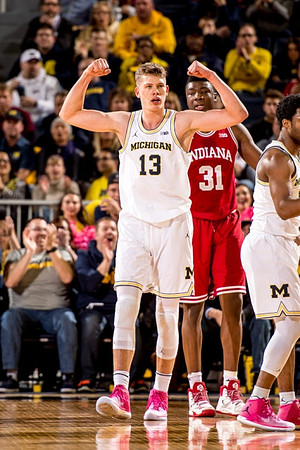 Moritz Wagner (13) and Derrick Walton Jr. (10)