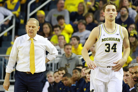 John Beilein, Mark Donnal (34), and Michigan Team