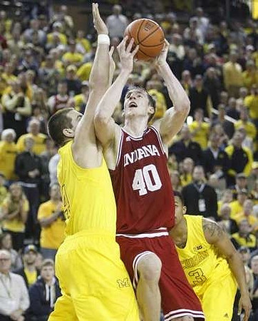 Mitch McGary (4) and Trey Burke (3)