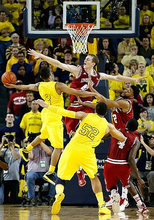 Trey Burke (3) and Jordan Morgan (52)