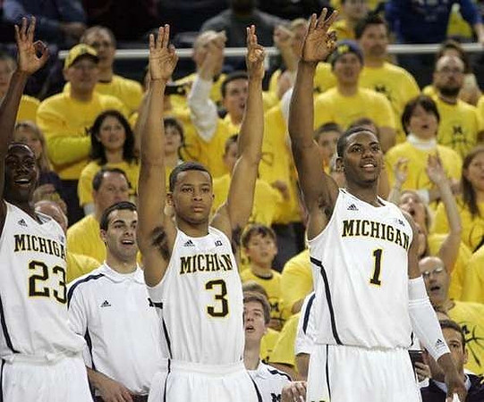 Caris LeVert (23), Trey Burke (3), and Glenn Robinson III (1)