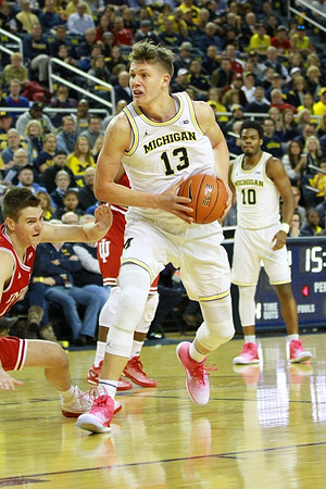 Moritz Wagner (13) and Derrick Walton Jr. (10)