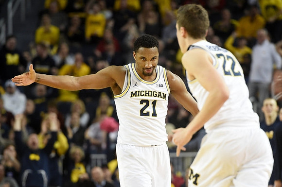 Zak Irvin (21) and Duncan Robinson (22)