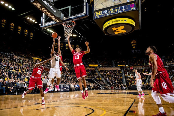 Derrick Walton Jr. (10) and Moritz Wagner (13)