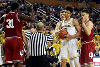 Moritz Wagner (13) and D.J. Wilson (5)