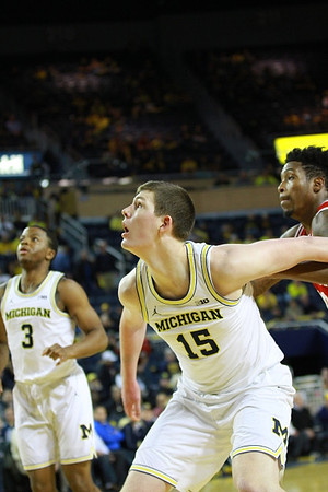 Xavier Simpson (3) and Jon Teske (15)