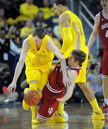 Nik Stauskas (11) and Jordan Morgan (52)