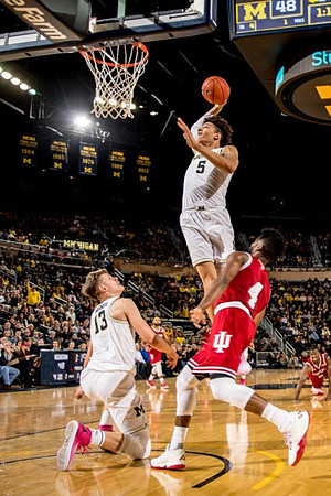 Moritz Wagner (13) and D.J. Wilson (5)