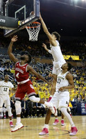 Muhammad-Ali Abdur-Rahkman (12), D.J. Wilson (5), and Zak Irvin (21)