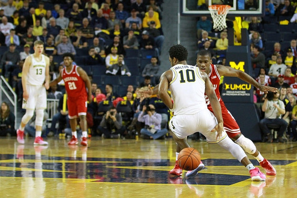 Moritz Wagner (13) and Derrick Walton Jr. (10)
