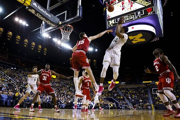 Muhammad-Ali Abdur-Rahkman (12) and D.J. Wilson (5)