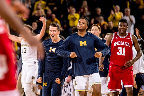 Moritz Wagner (13), Andrew Dakich (11) , Xavier Simpson (3), and Mark Donnal (34)