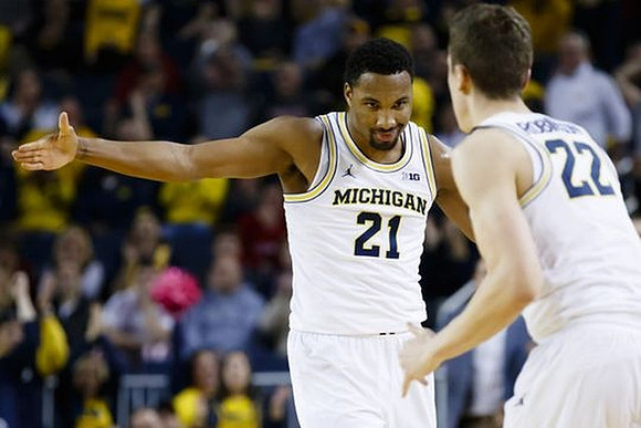 Zak Irvin (21) and Duncan Robinson (22)