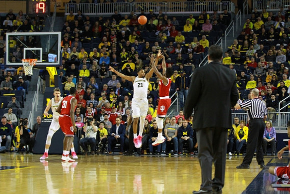 Moritz Wagner (13), Zak Irvin (21), and Indiana Head Coach Tom Crean
