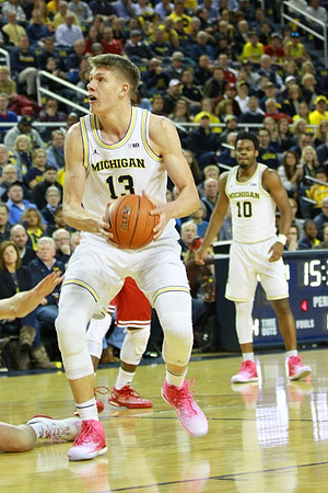 Moritz Wagner (13) and Derrick Walton Jr. (10)