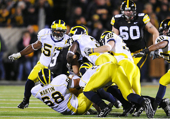 Brandon Graham (55), Mike Martin (68), Stevie Brown (3), Jordan Kovacs (32), and Michael Williams (40)
