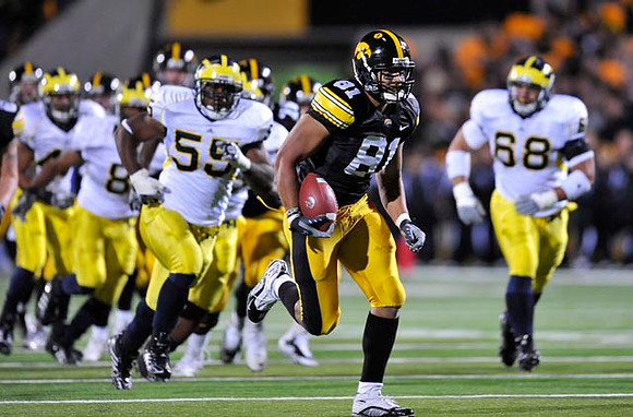 Jonas Mouton (8), Brandon Graham (55), and Mike Martin (68)