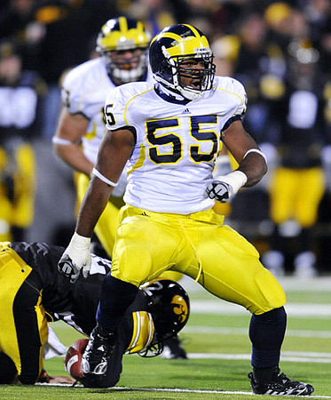 Brandon Graham (55) and Ryan Van Bergen (53)