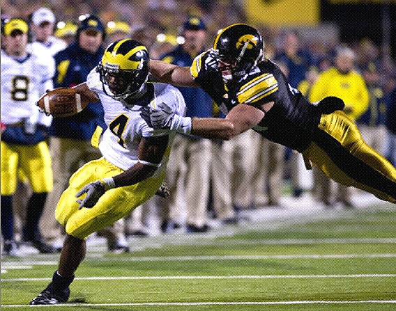 Brandon Minor (4), Nick Sheridan (8), and Rich Rodriguez