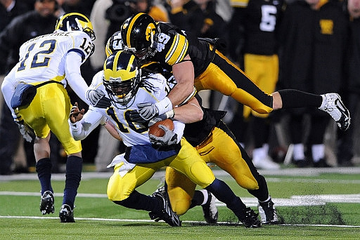 Roy Roundtree (12) and Denard Robinson (16)