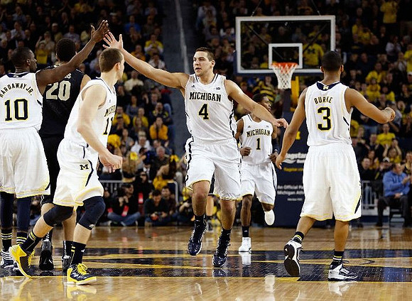 Tim Hardaway Jr. (10), Nik Stauskas (11), Mitch McGary (4), Glenn Robinson III (1), and Trey Burke (3)