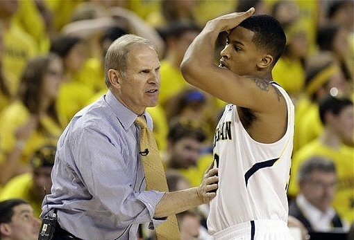 Trey Burke (3) and John Beilein
