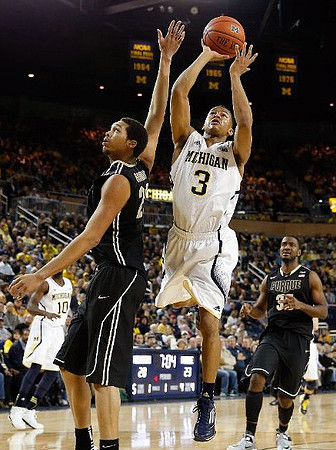Trey Burke (3) and Tim Hardaway Jr. (10)