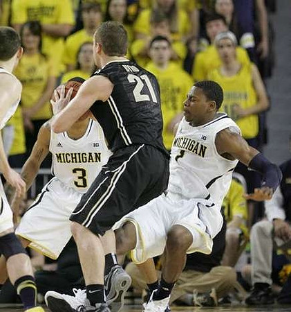 Nik Stauskas (11), Trey Burke (3), and Glenn Robinson III (1)