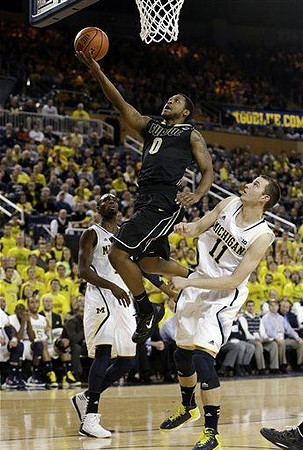 Tim Hardaway Jr. (10) and Nik Stauskas (11)