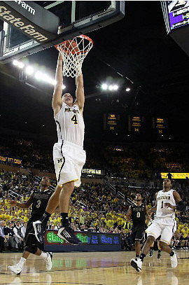 Mitch McGary (4) and Glenn Robinson III (1)