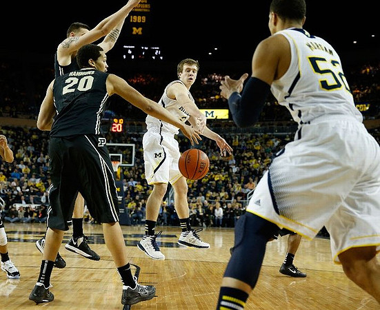 Spike Albrecht (2) and Jordan Morgan (52)
