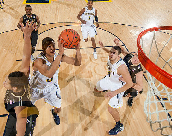 Trey Burke (3), Mitch McGary (4), and Glenn Robinson III (1)