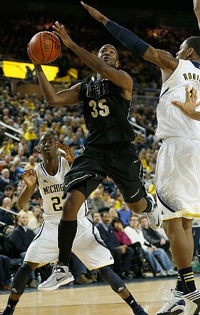 Caris LeVert (23) and Glenn Robinson III (1)
