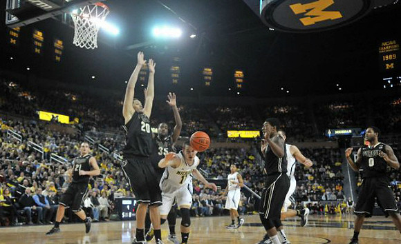 Nik Stauskas (11) and Trey Burke (3)