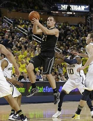 Trey Burke (3), Tim Hardaway Jr. (10), and Nik Stauskas (11)