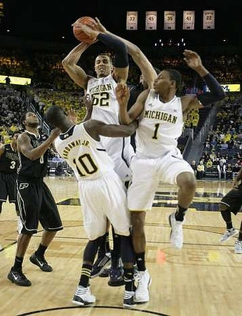 Tim Hardaway Jr. (10), Jordan Morgan (52), and Glenn Robinson III (1)
