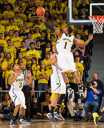 Trey Burke (3), Glenn Robinson III (1), and Jordan Morgan (52)