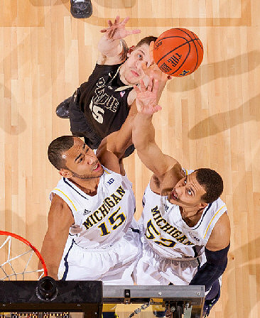 Jon Horford (15) and Jordan Morgan (52)