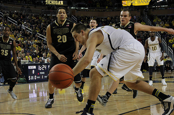 Mitch McGary (4), Nik Stauskas (11), and Tim Hardaway Jr. (10)