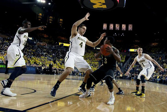 Tim Hardaway Jr. (10), Mitch McGary (4), and Nik Stauskas (11)