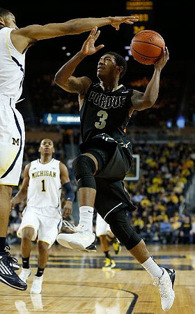 Trey Burke (3) and Glenn Robinson III (1)