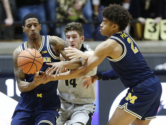 Charles Matthews (1) and Jordan Poole (2)