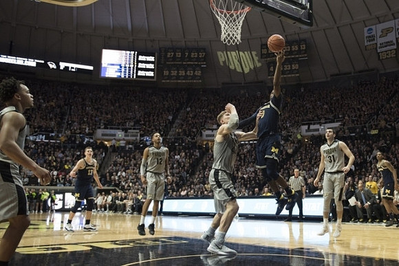 Moritz Wagner (13), Zavier Simpson (3), and Charles Matthews (1)