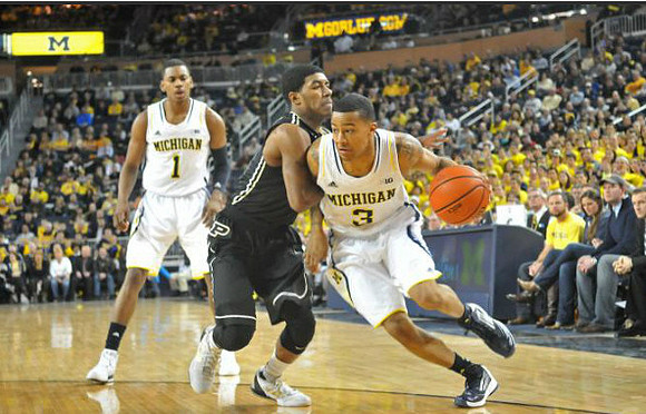 Glenn Robinson III (1) and Trey Burke (3)