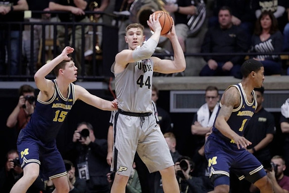 Jon Teske (15) and Charles Matthews (1)