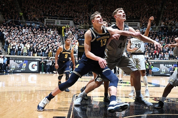 Moritz Wagner (13) and Jaaron Simmons (5)