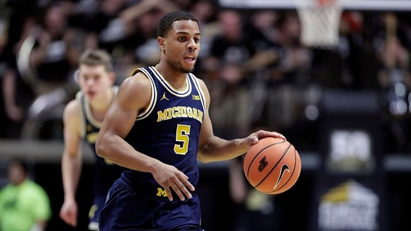 Jaaron Simmons (5) and Moritz Wagner (13)