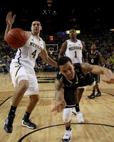 Mitch McGary (4) and Glenn Robinson III (1)