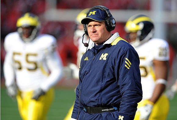Jibreel Black (55) and Rich Rodriguez