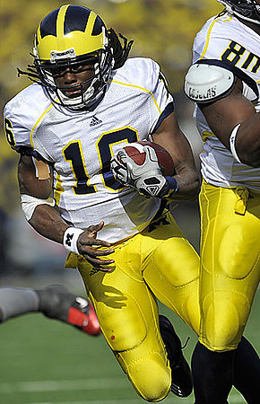 Denard Robinson (16) and Martell Webb (80)